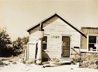 RUSSELL LEE (1903-1986) Post office * Garage at Rawson, McKenzie County, North Dakota * Lumberjacks using peaveys to remove legs from b